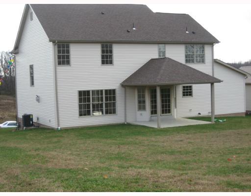 1016 Rowe Road Harrison City, PA 15636 - Photo 2 of 18 Exterior Back. This spacious home has a covered rear patio ,off of Eat in Kitchen area.