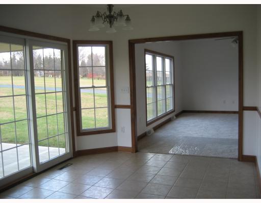 1016 Rowe Road Harrison City, PA 15636 - Photo 8 of 18 Kitchen. Kichen has large table area with door to rear covered deck.