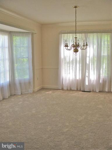 9415 Bluefield Road Springdale, MD 20721 - Photo 10 of 11 Dining room with bay window.