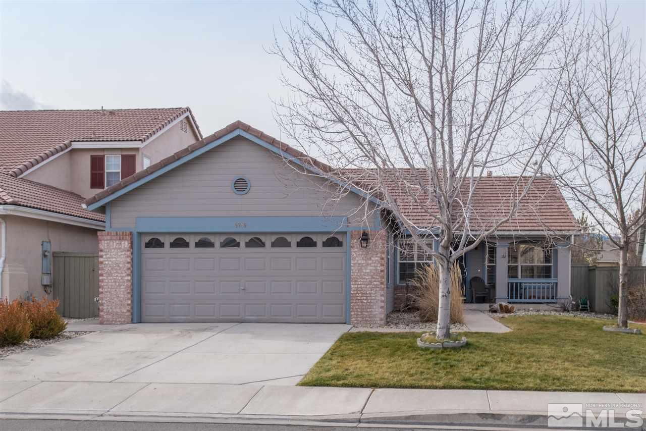 9759 Northrup Drive Reno, NV 89521 - Photo 1 of 1 a front view of a house with a yard