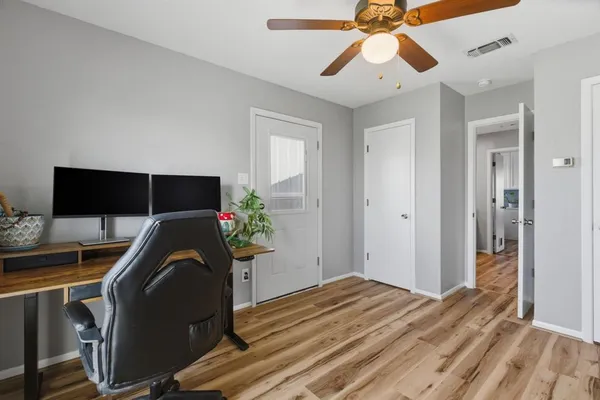 a living room with furniture and a window