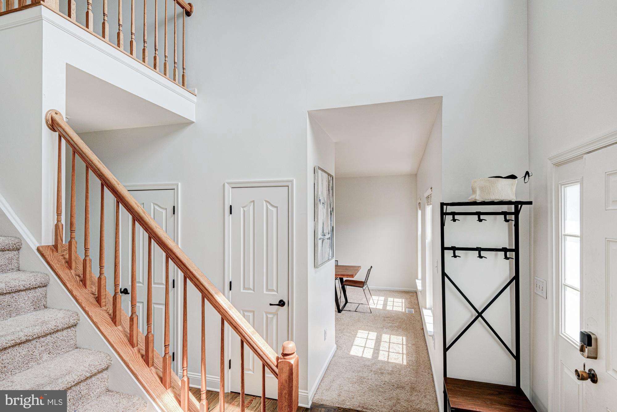 11 Basalt Street Townsend, DE 19734 - Photo 17 of 65 a view of a hallway with wooden floor and staircase
