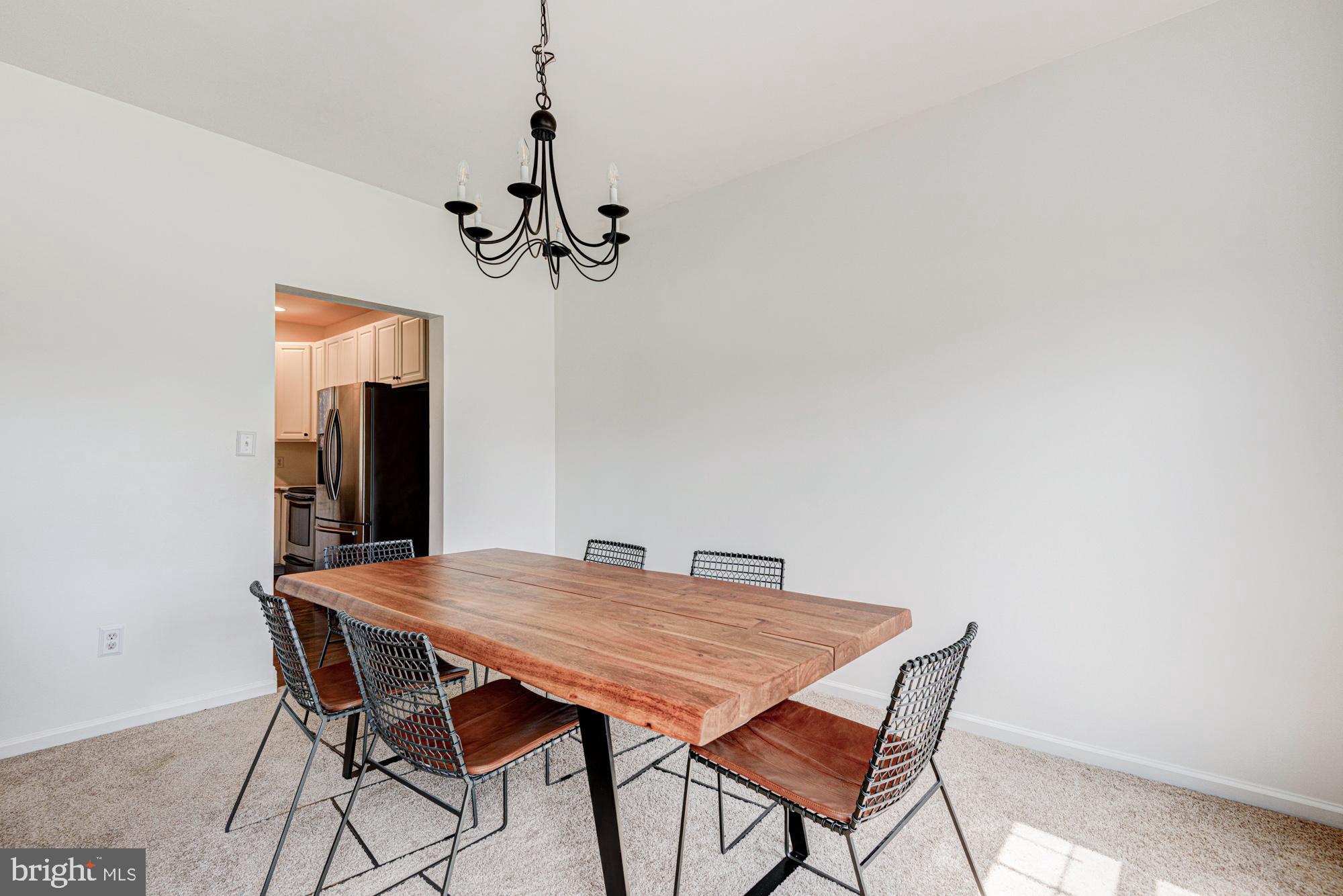 11 Basalt Street Townsend, DE 19734 - Photo 18 of 65 a view of a dining room with furniture and wooden floor