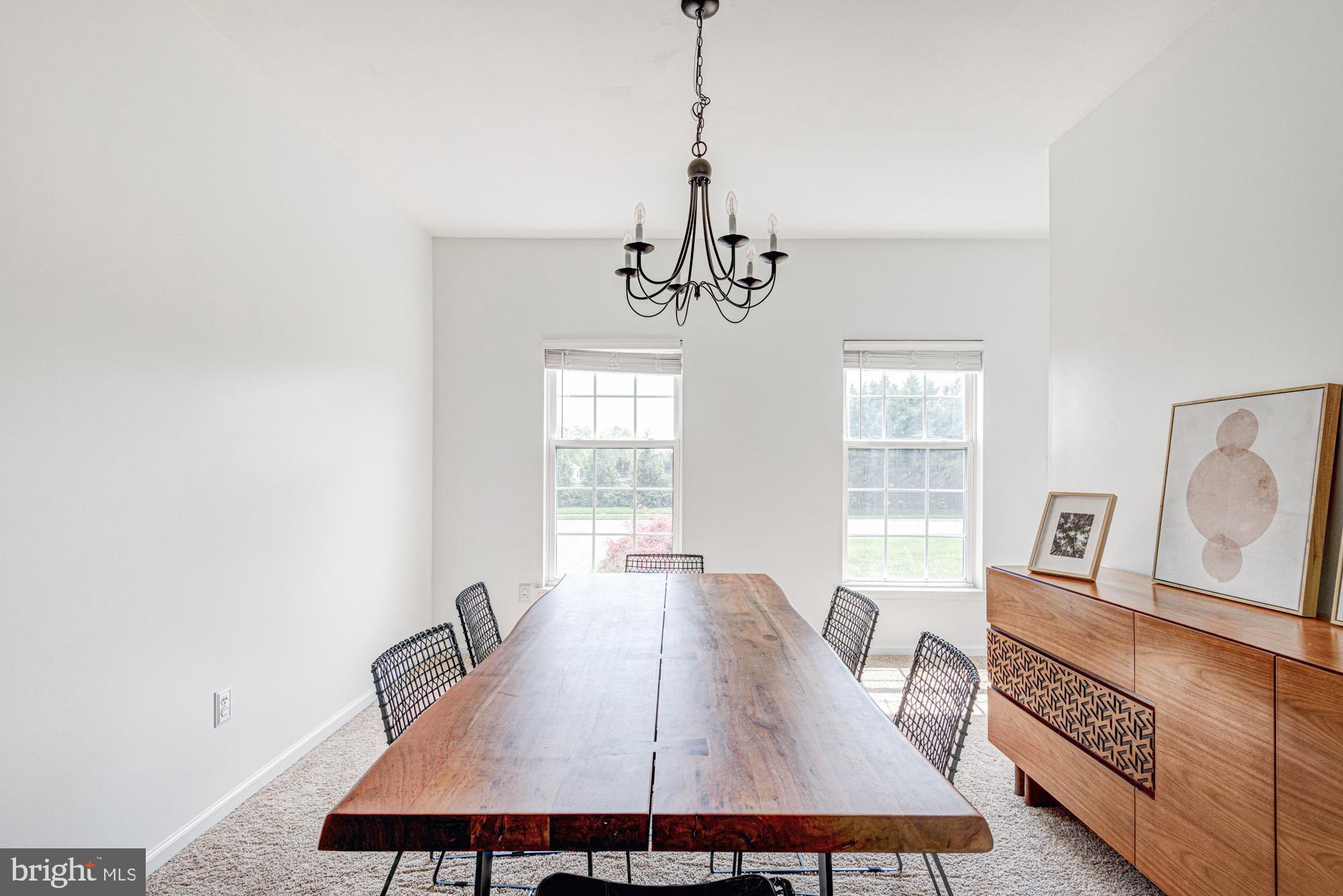 11 Basalt Street Townsend, DE 19734 - Photo 19 of 65 a view of a dining room with furniture window and wooden floor