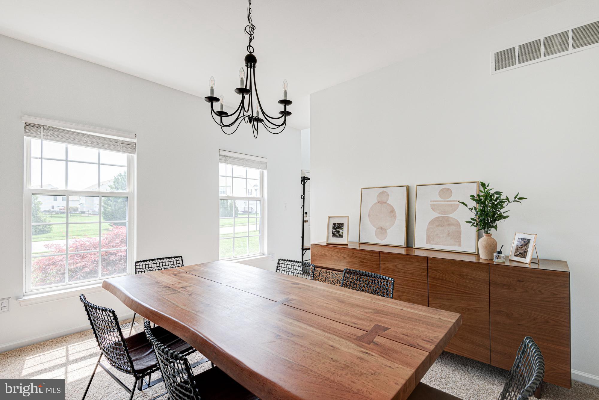11 Basalt Street Townsend, DE 19734 - Photo 20 of 65 a view of a dining room with furniture window and wooden floor