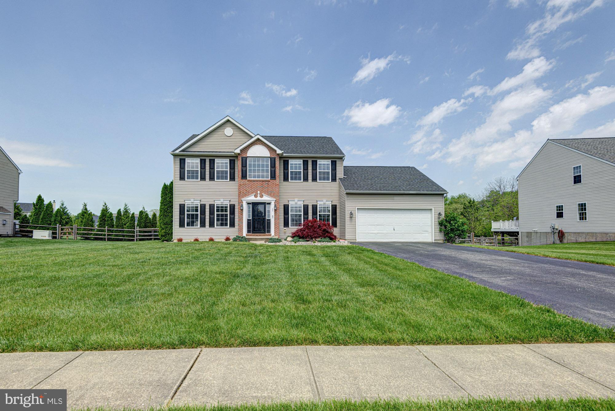 11 Basalt Street Townsend, DE 19734 - Photo 2 of 65 a front view of a house with a garden