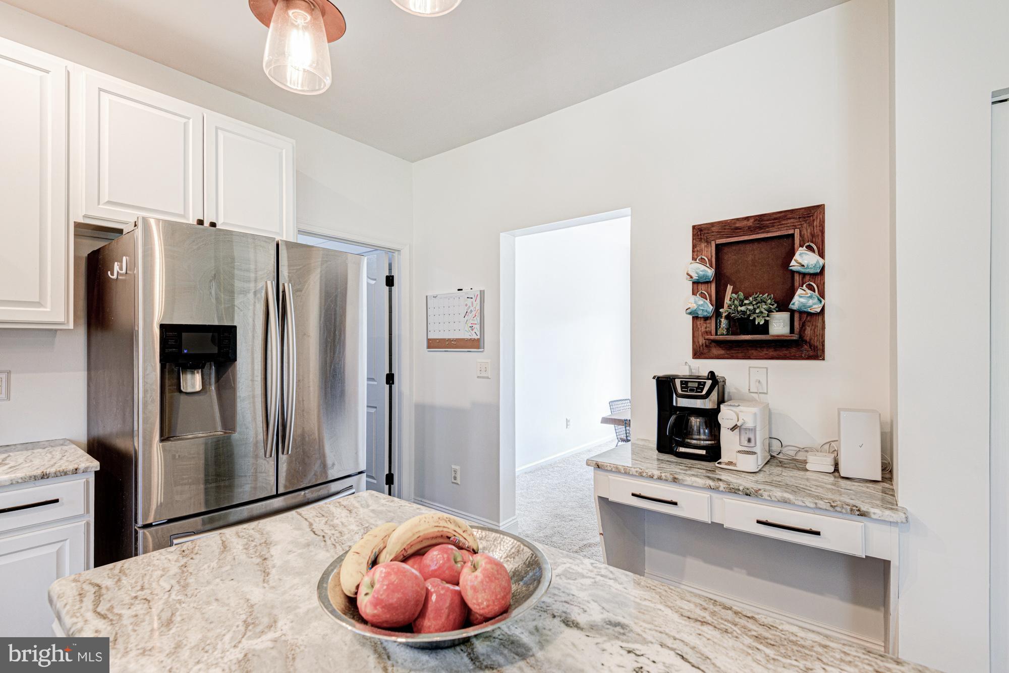 11 Basalt Street Townsend, DE 19734 - Photo 25 of 65 a kitchen with stainless steel appliances a refrigerator and a stove