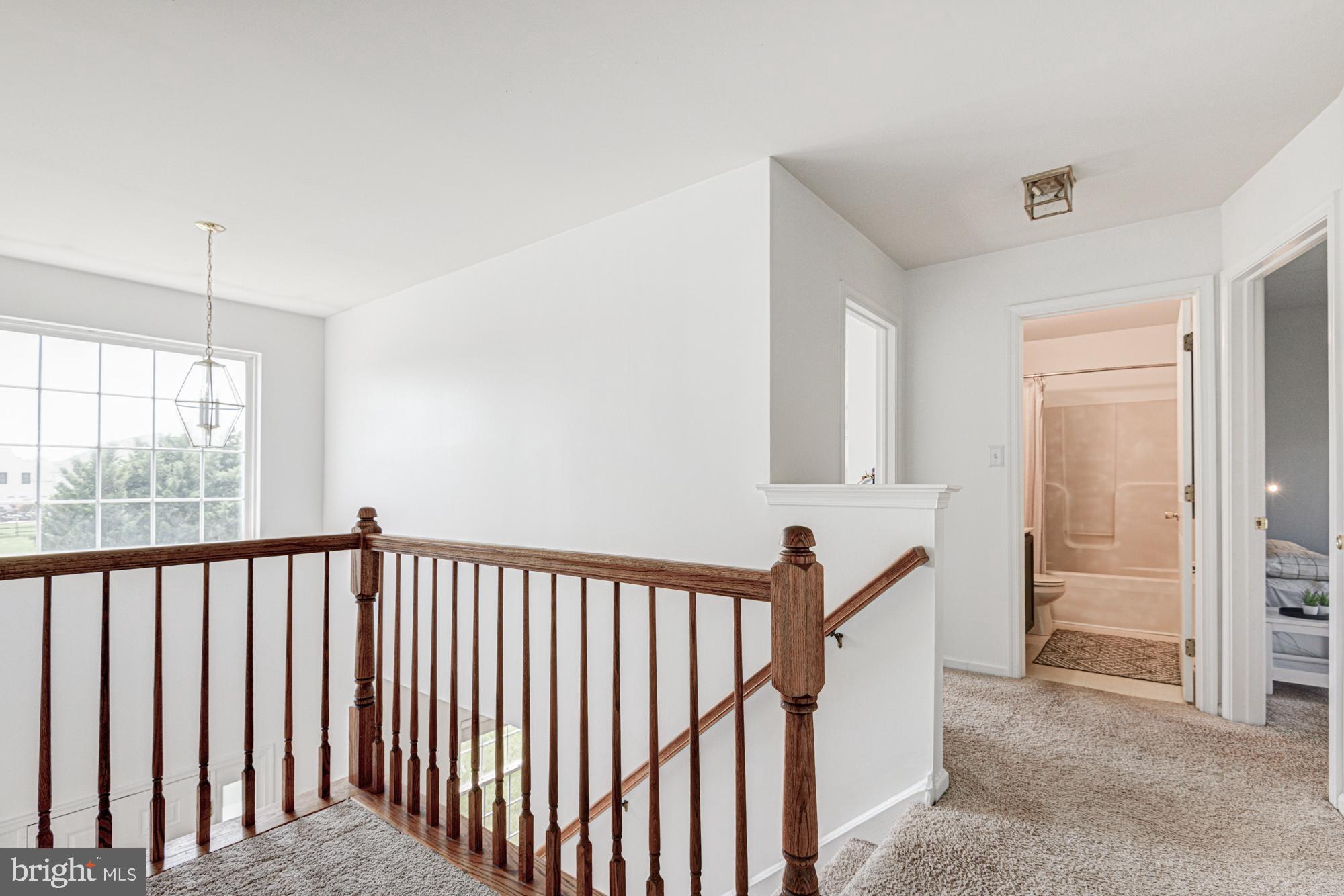 11 Basalt Street Townsend, DE 19734 - Photo 40 of 65 a view of a hallway with windows