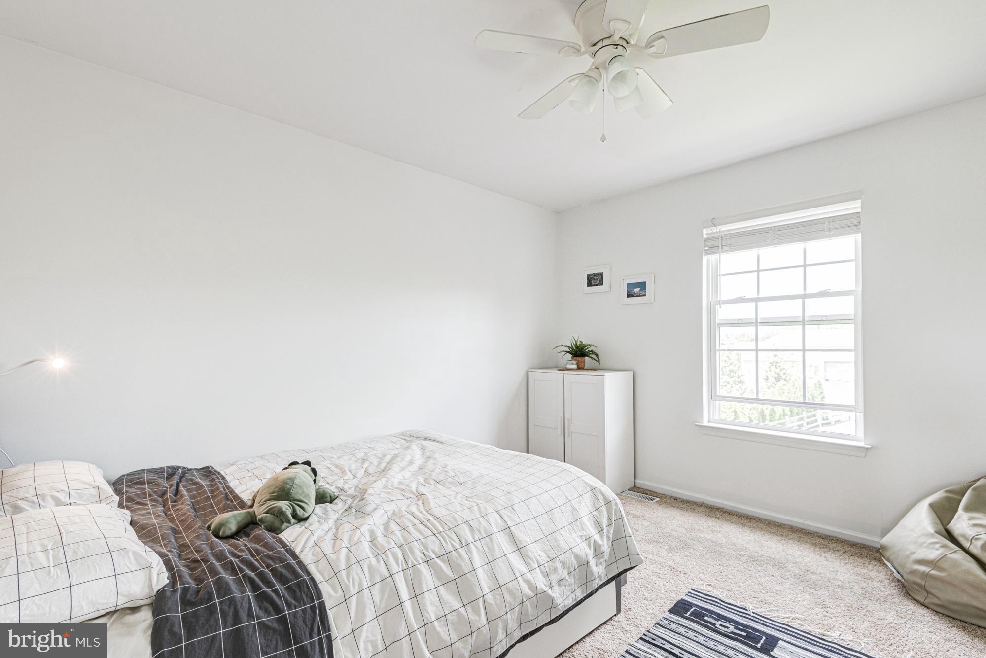 11 Basalt Street Townsend, DE 19734 - Photo 43 of 65 a bedroom with a bed and a window