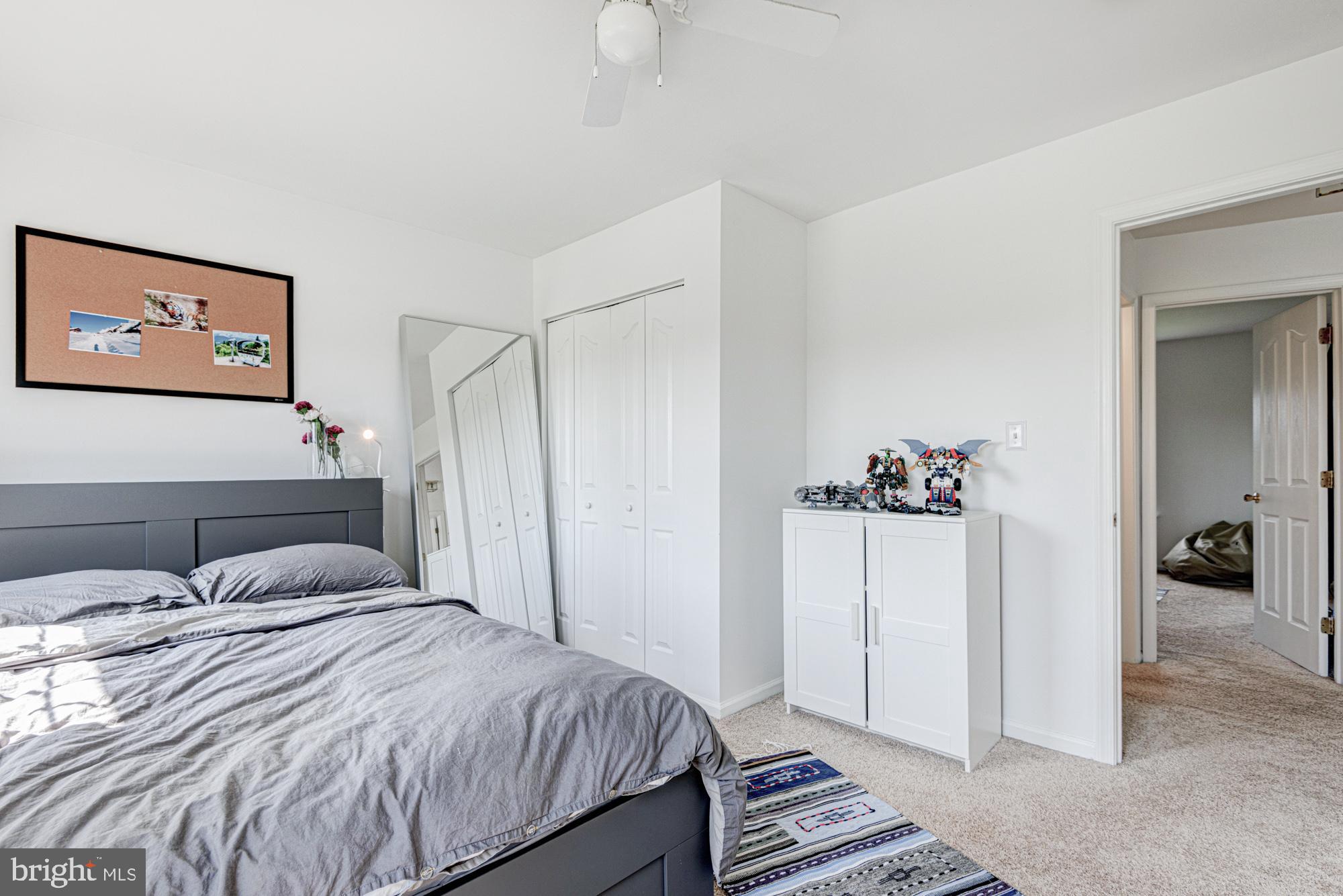 11 Basalt Street Townsend, DE 19734 - Photo 48 of 65 a bedroom with a bed and a view of bathroom