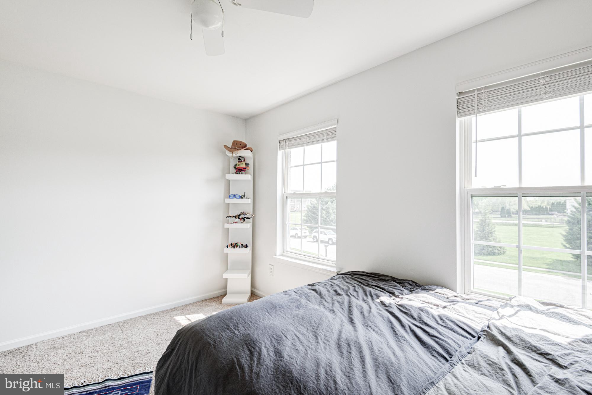 11 Basalt Street Townsend, DE 19734 - Photo 49 of 65 a bedroom with a bed and a window