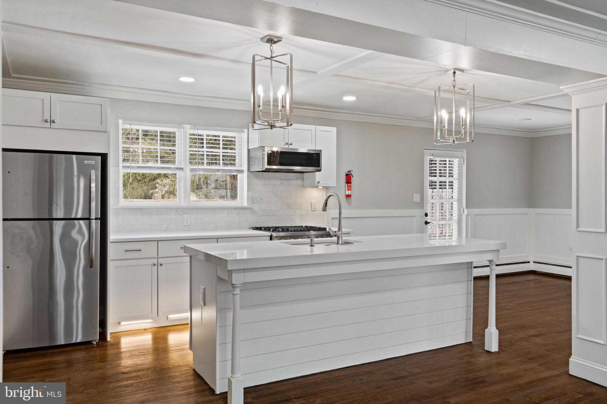 383 Upper Gulph Road Wayne, PA 19087 - Photo 17 of 42 a kitchen with a refrigerator and a sink
