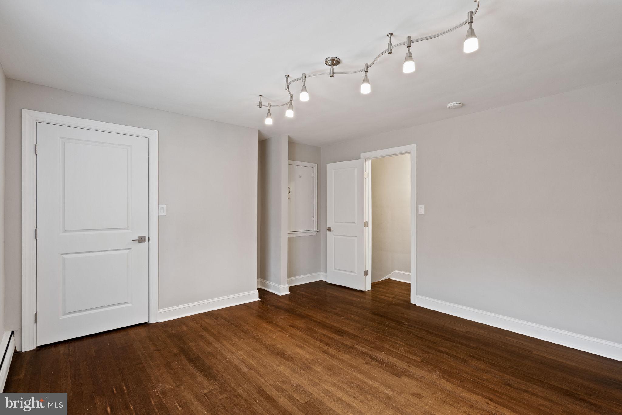 383 Upper Gulph Road Wayne, PA 19087 - Photo 22 of 42 a view of an empty room with wooden floor