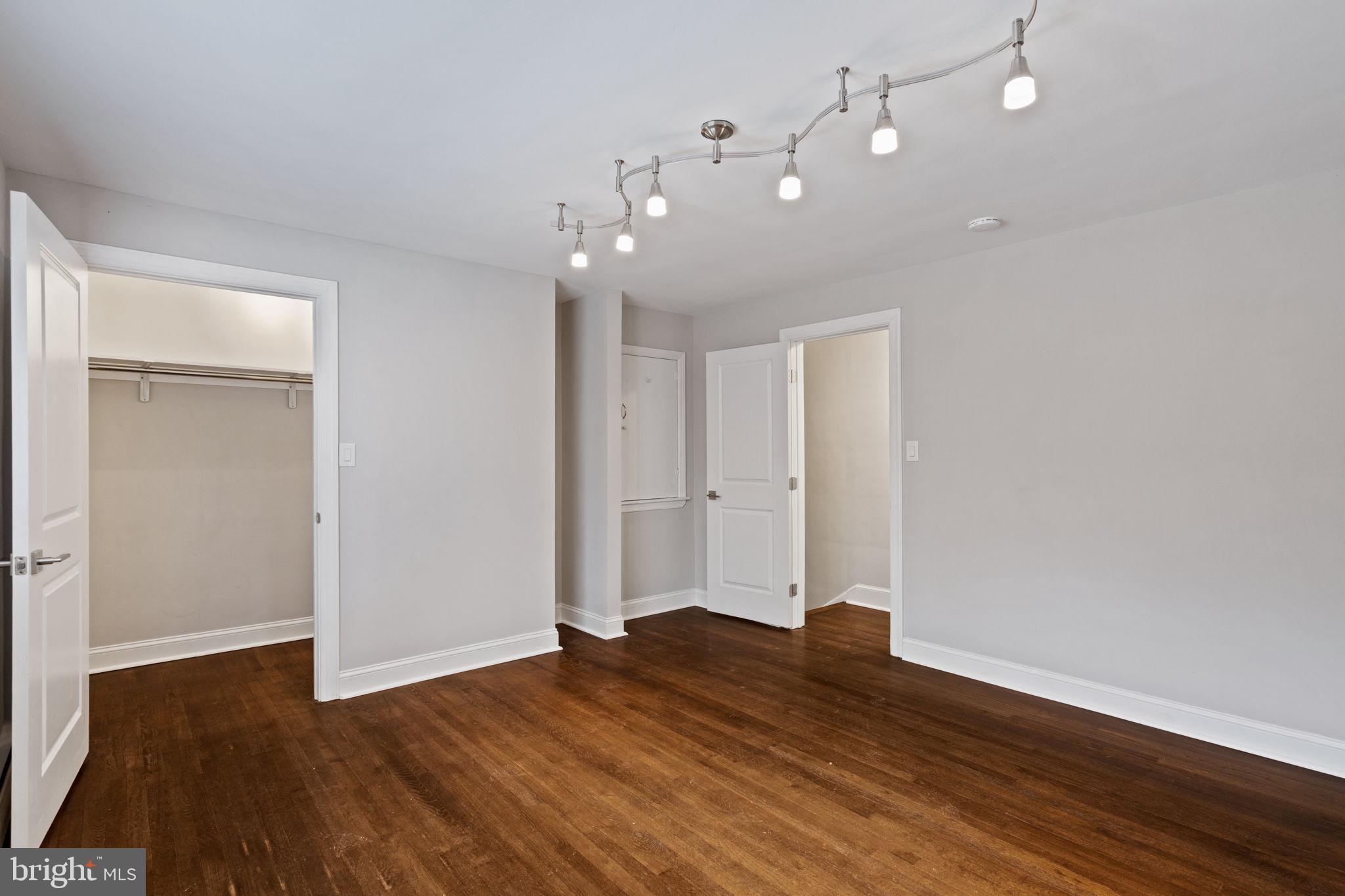383 Upper Gulph Road Wayne, PA 19087 - Photo 23 of 42 a view of an empty room with wooden floor