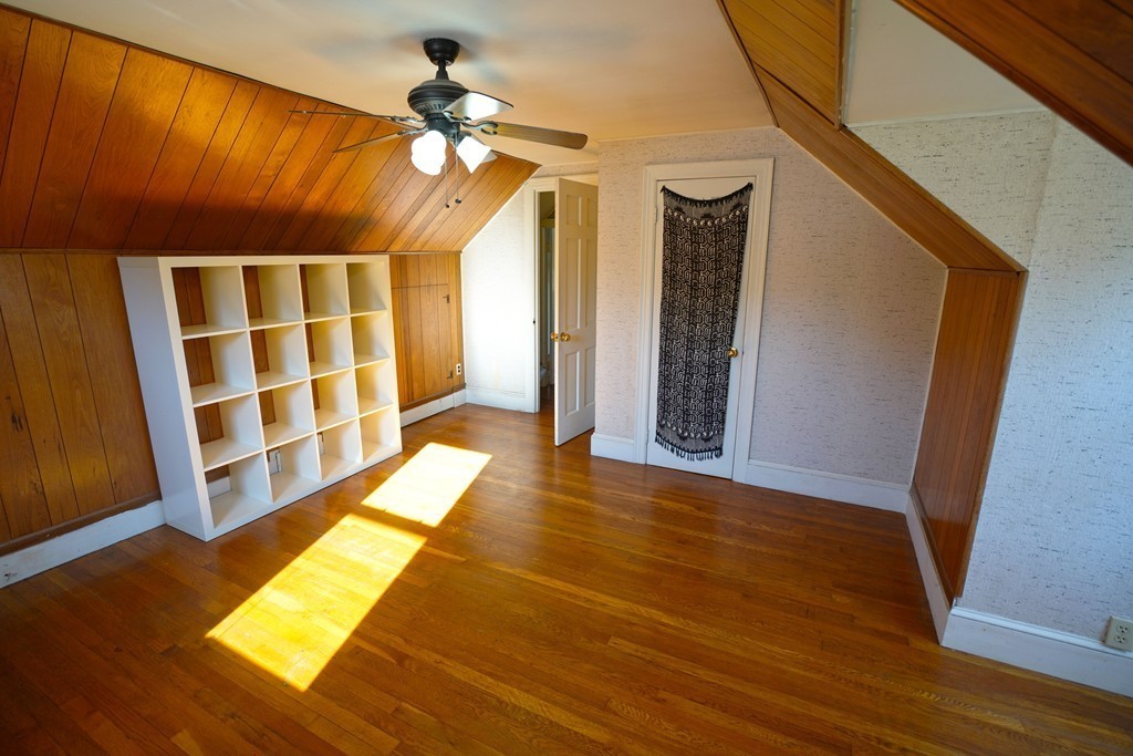 248 Abbott Street Springfield, MA 01118 - Photo 17 of 20 a view of a room with wooden floor and door