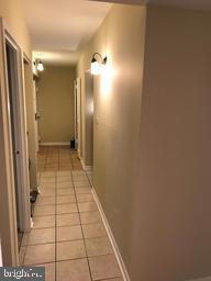 2247 Castle Rock Square, Unit 2B Reston, VA 20191 - Photo 13 of 17 Hallway with a lot of light.