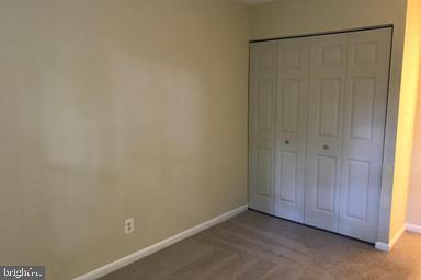 2247 Castle Rock Square, Unit 2B Reston, VA 20191 - Photo 9 of 17 Second bedroom with a large closet.