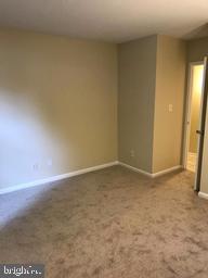2247 Castle Rock Square, Unit 2B Reston, VA 20191 - Photo 10 of 17 Master bedroom with a walking closet.