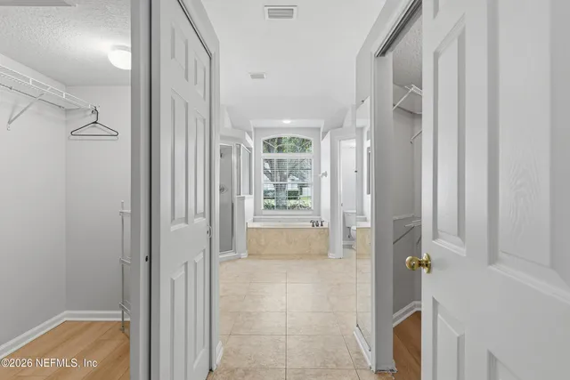 a view of a bathroom from the hallway