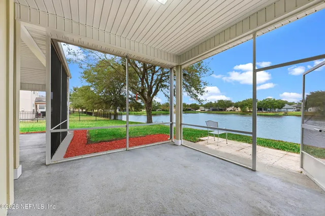 a view of park with large trees
