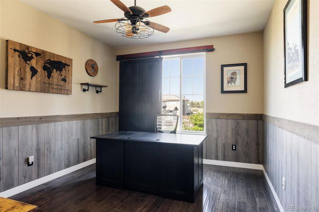 a view of kitchen with window and wooden floor