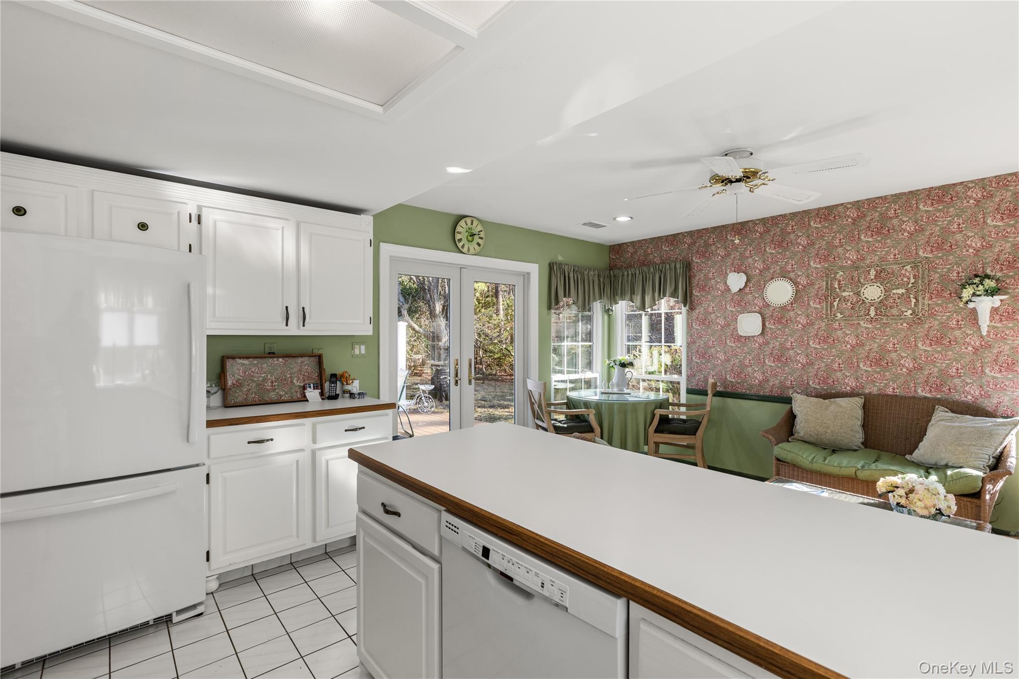 77 Glen Drive Ridge, NY 11961 - Photo 13 of 27 a kitchen with a sink appliances and cabinets