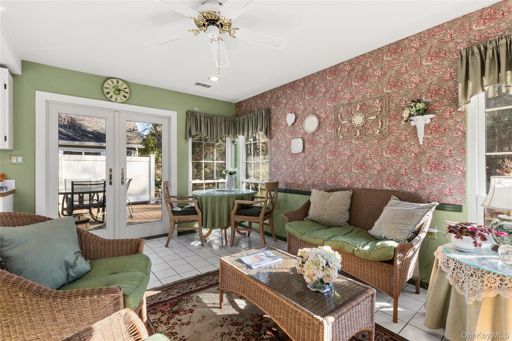 77 Glen Drive Ridge, NY 11961 - Photo 14 of 27 a living room with furniture and a large window