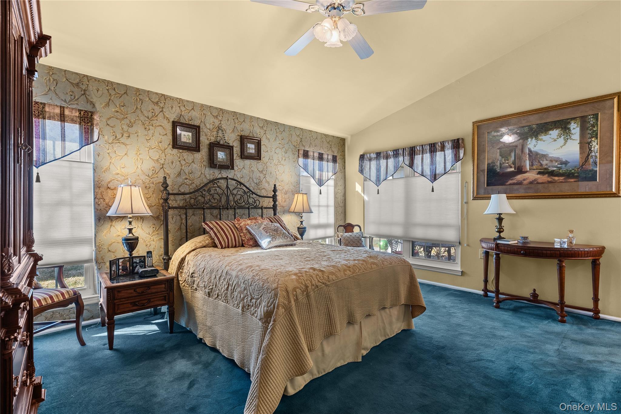 77 Glen Drive Ridge, NY 11961 - Photo 16 of 27 a bedroom with a bed and dresser next to a window