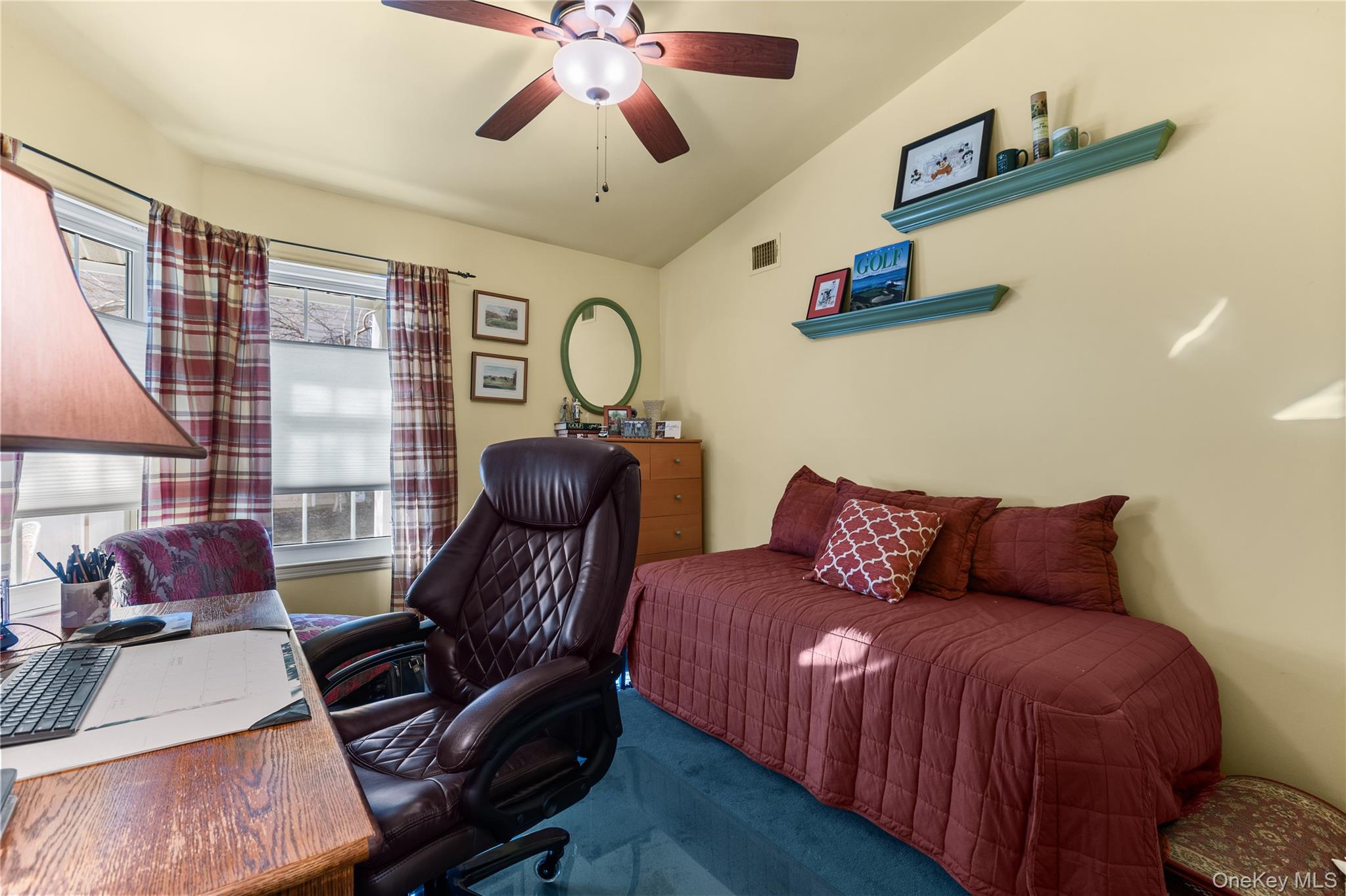 77 Glen Drive Ridge, NY 11961 - Photo 20 of 27 a bed room with a bed and a chair