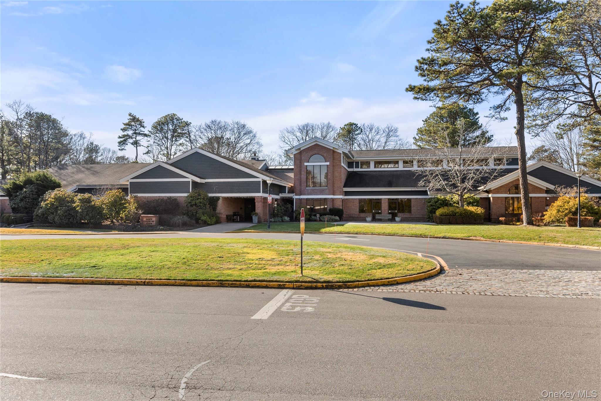 77 Glen Drive Ridge, NY 11961 - Photo 3 of 27 a front view of a house with a yard