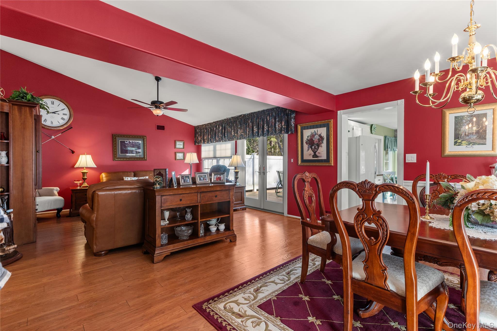 77 Glen Drive Ridge, NY 11961 - Photo 6 of 27 a view of a dining room with furniture and chandelier