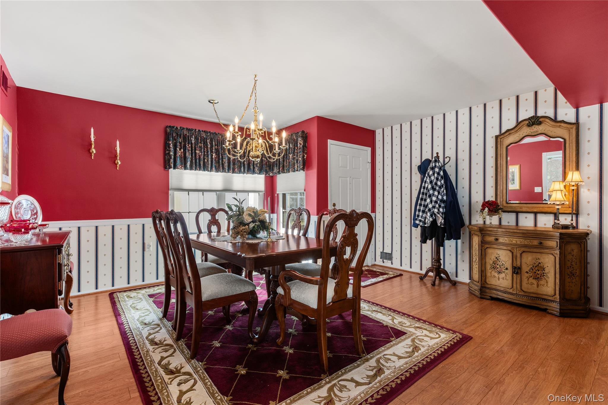 77 Glen Drive Ridge, NY 11961 - Photo 7 of 27 a view of a dining room with furniture and wooden floor