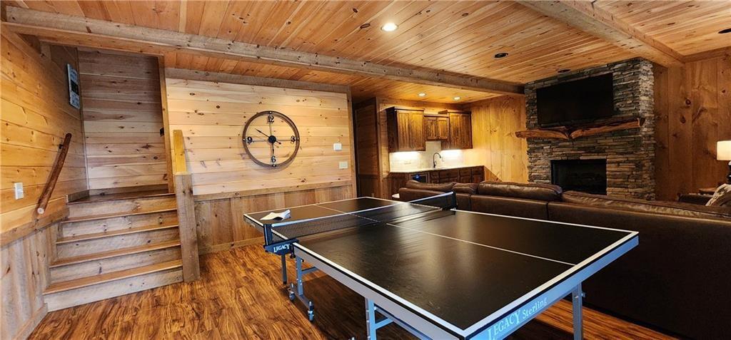 101 Hothouse Drive Mineral Bluff, GA 30559 - Photo 11 of 63 a kitchen with stainless steel appliances granite countertop a sink and a wooden floors