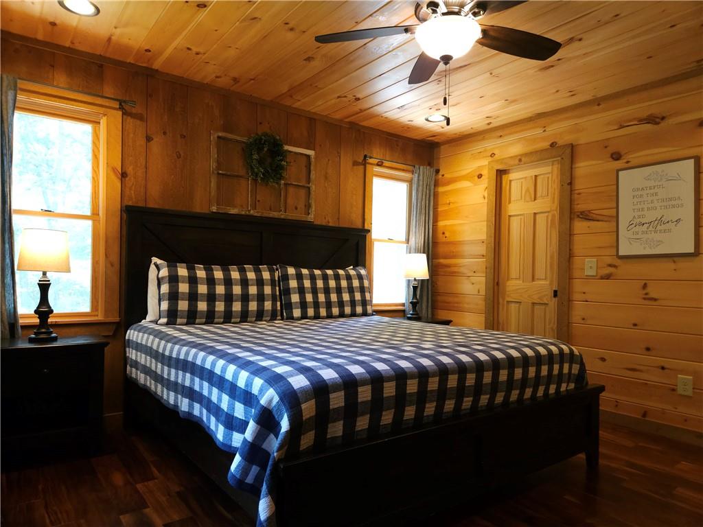 101 Hothouse Drive Mineral Bluff, GA 30559 - Photo 20 of 63 a bedroom with a bed table and window