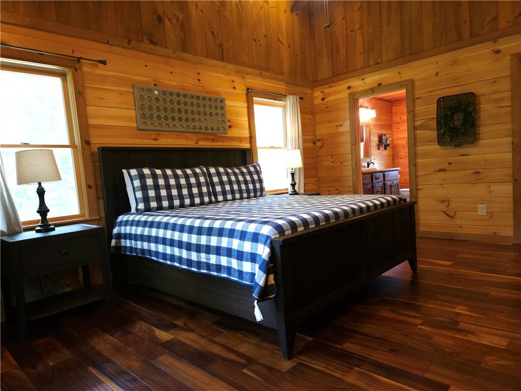 101 Hothouse Drive Mineral Bluff, GA 30559 - Photo 31 of 63 a bedroom with a bed and window