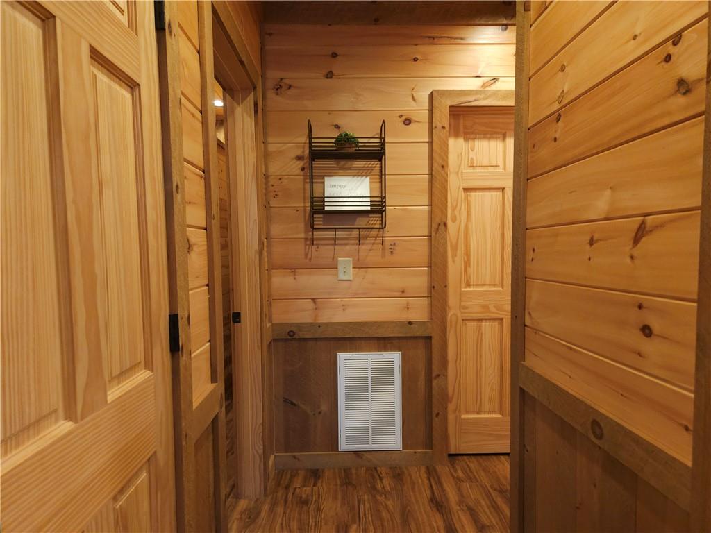 101 Hothouse Drive Mineral Bluff, GA 30559 - Photo 42 of 63 a bathroom with a shower and a mirror