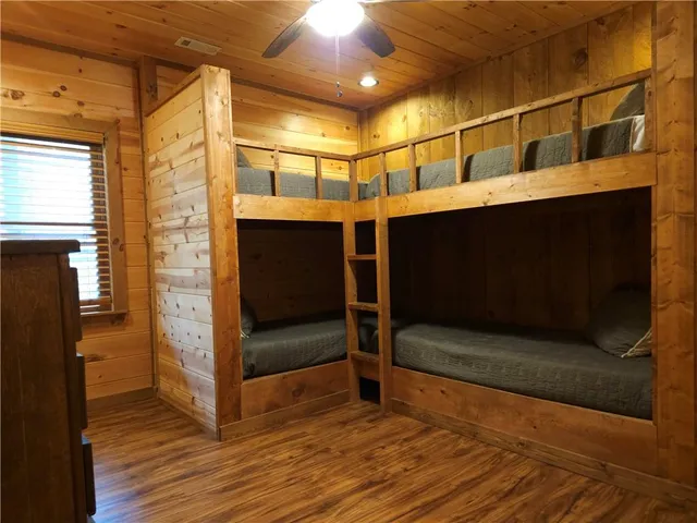 a view of two chairs in the balcony