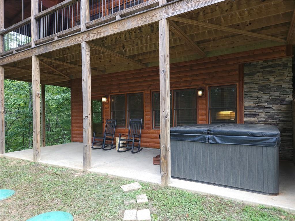 101 Hothouse Drive Mineral Bluff, GA 30559 - Photo 50 of 63 a view of a house with a porch