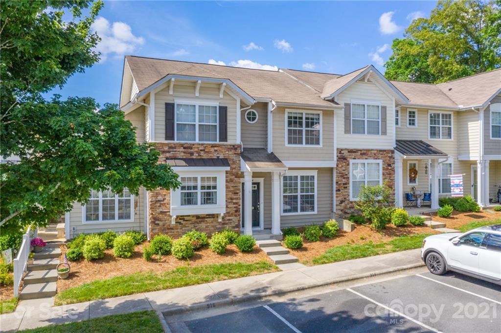 914 Copperstone Lane, Unit 177 Fort Mill, SC 29708 - Photo 2 of 27 front view of a house with a yard