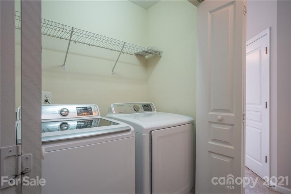 914 Copperstone Lane, Unit 177 Fort Mill, SC 29708 - Photo 16 of 27 a utility room with dryer and washer