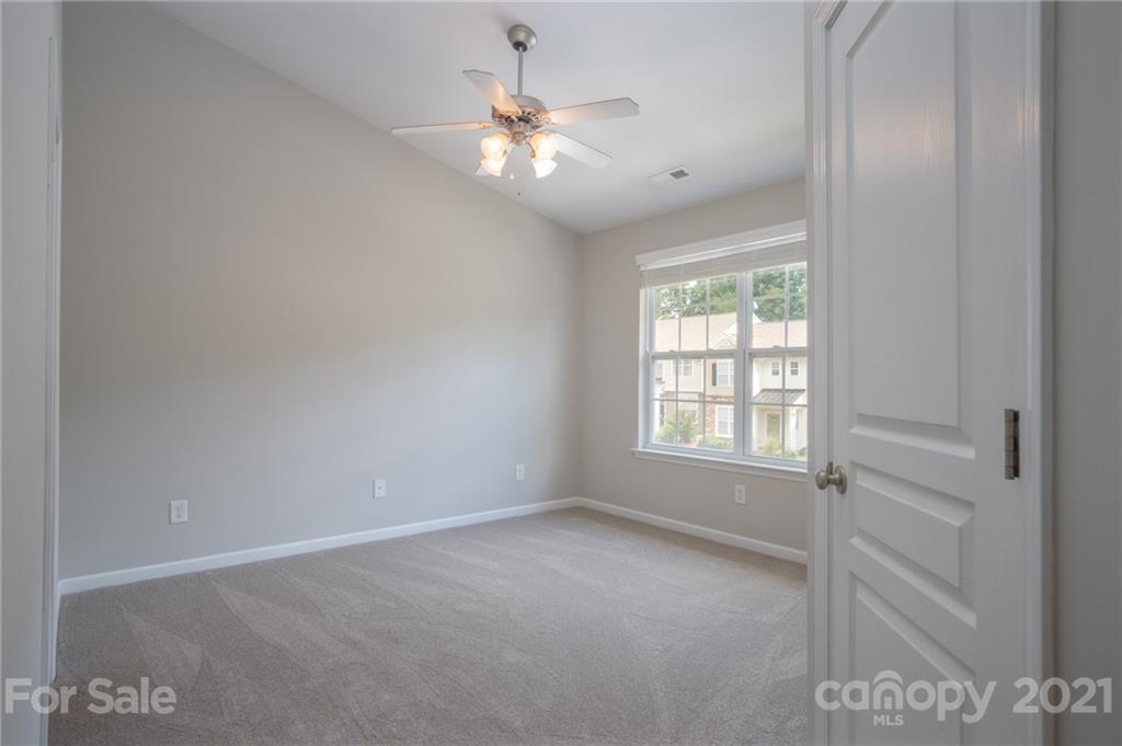 914 Copperstone Lane, Unit 177 Fort Mill, SC 29708 - Photo 18 of 27 a view of an empty room with a window