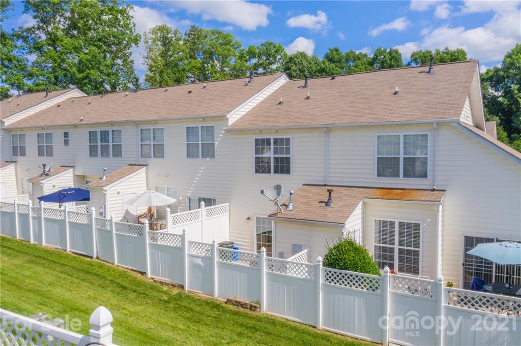 914 Copperstone Lane, Unit 177 Fort Mill, SC 29708 - Photo 24 of 27 a view of a house with a yard porch and sitting area