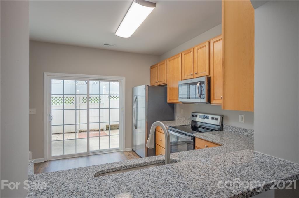 914 Copperstone Lane, Unit 177 Fort Mill, SC 29708 - Photo 8 of 27 a view of a livingroom with workspace and a window