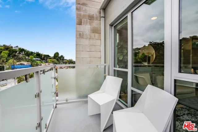 a view of a lake from a balcony