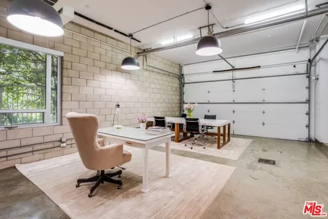 a view of a patio with swimming pool