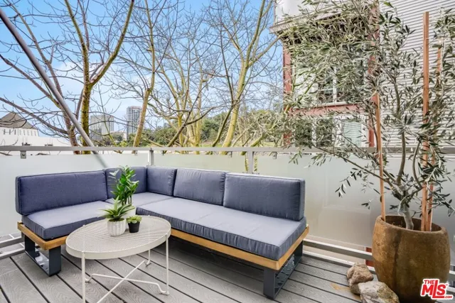 a bathroom with a sink a vanity and a mirror