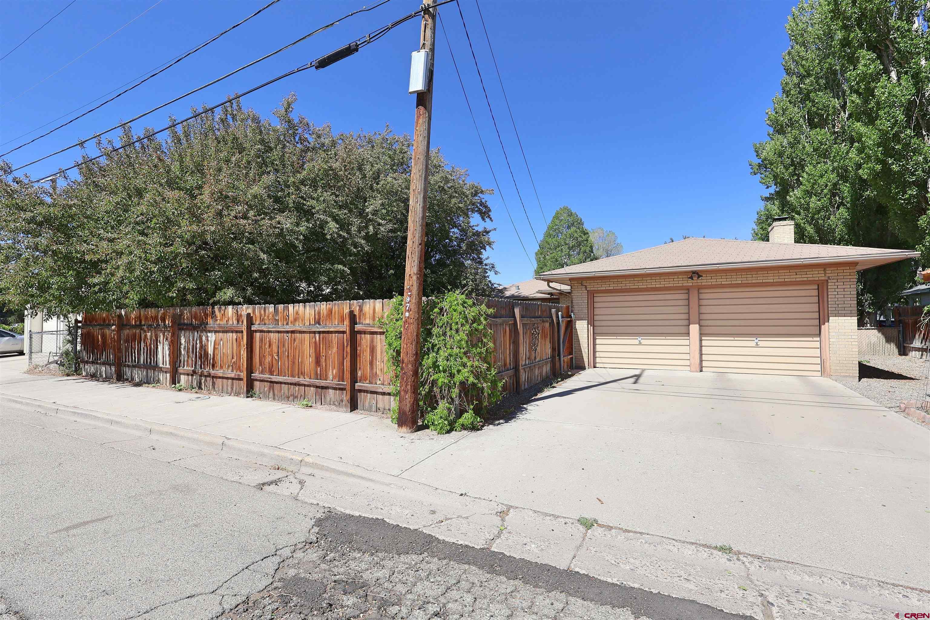 96 El Rio Drive Alamosa, CO 81101 - Photo 17 of 18 a view of a house with a garage