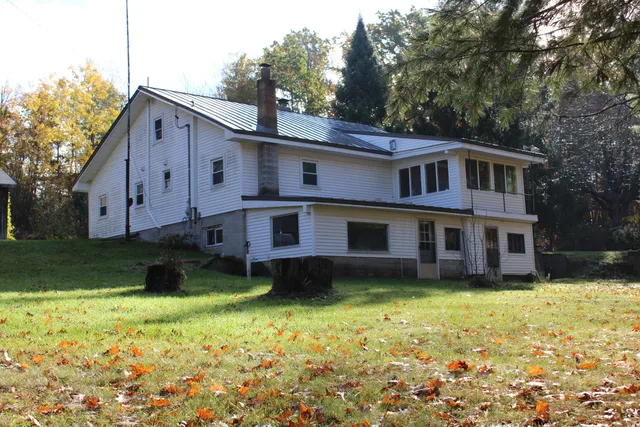 $650,000 | 401 South Bass Lake Avenue, Harrison, MI 48625