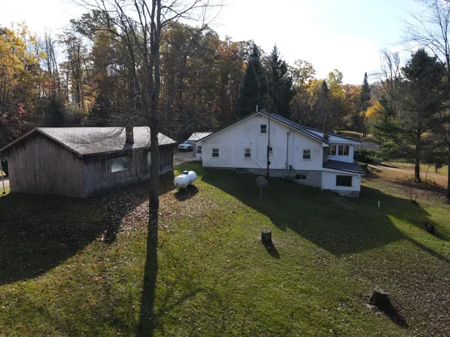 $650,000 | 401 South Bass Lake Avenue, Harrison, MI 48625