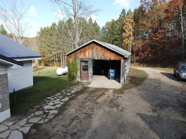 $650,000 | 401 South Bass Lake Avenue, Harrison, MI 48625